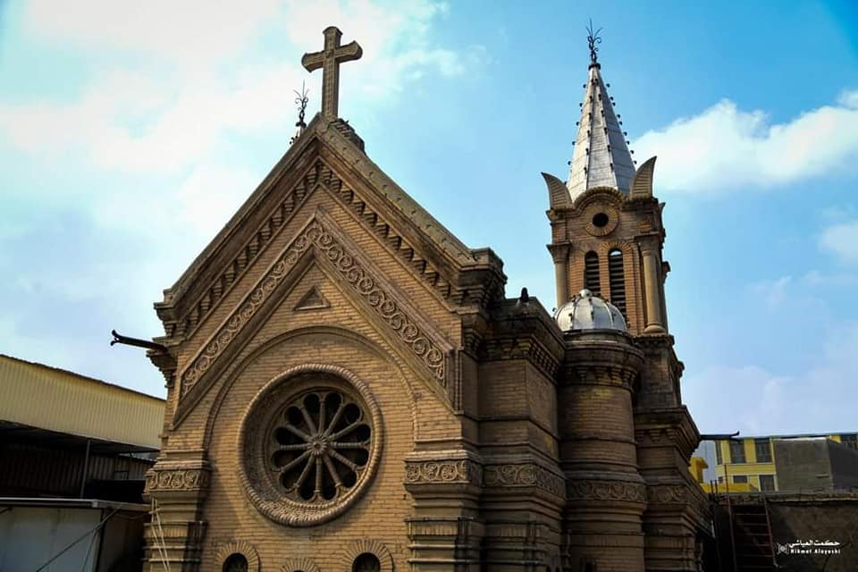 church building in Baghdad under a dramatic sky