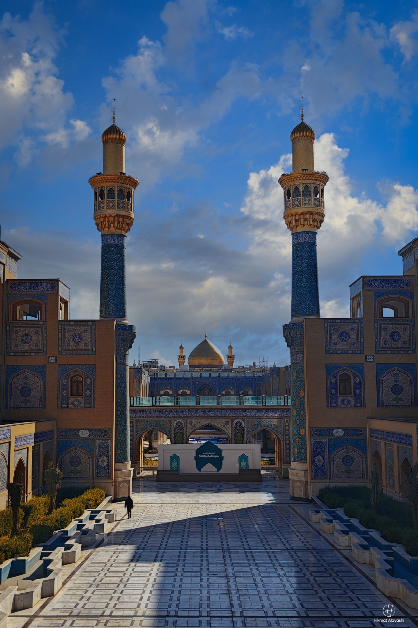 Imam Ali shrine with sunlight and golden dome in Najaf Iraq