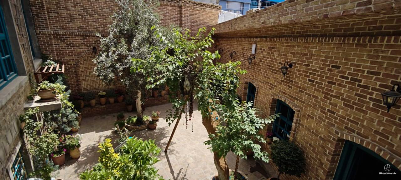 traditional courtyard house with trees in Sulaymaniyah Iraq