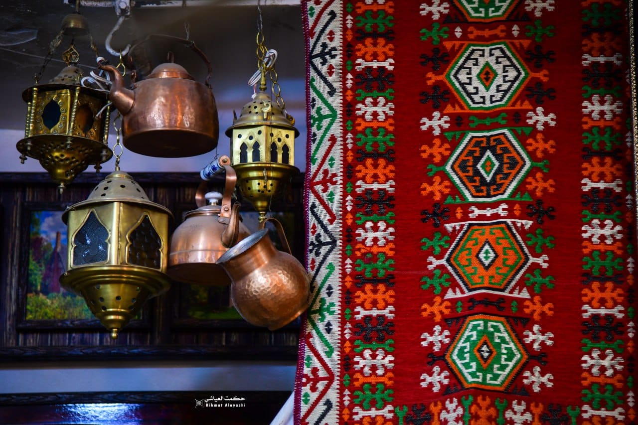 traditional colorful Iraqi carpet with geometric patterns
