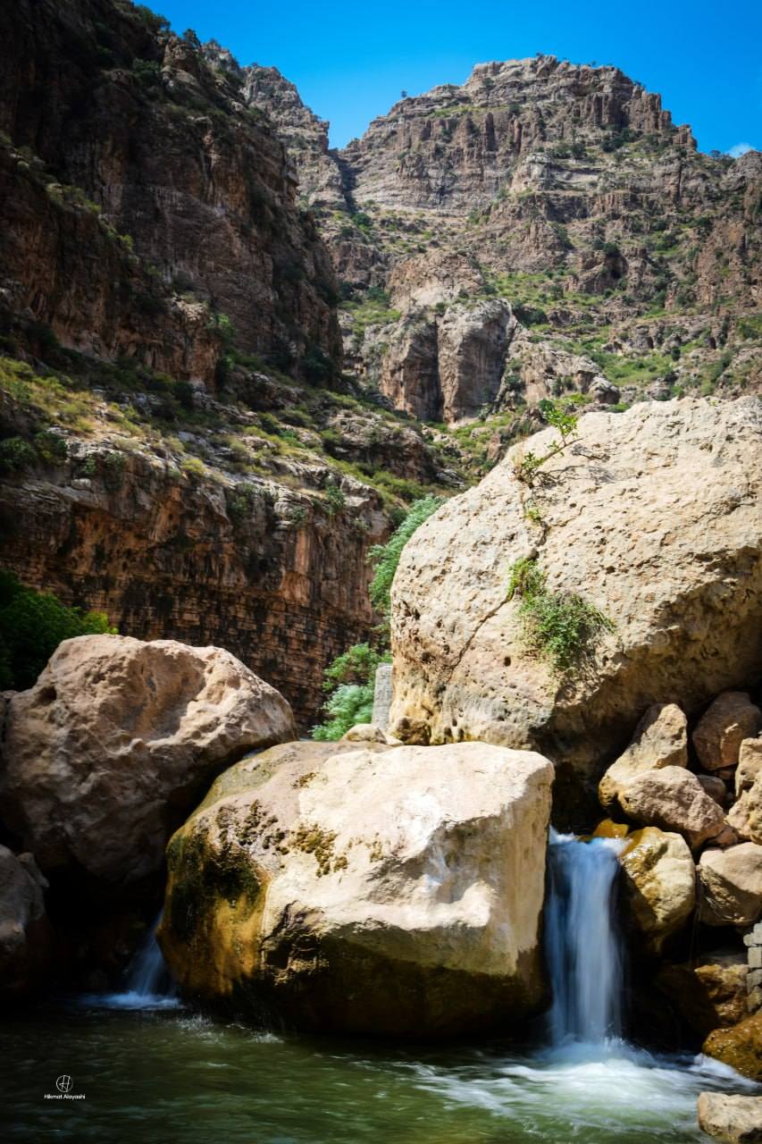 waterfall flowing through rocky mountains in northern Iraq